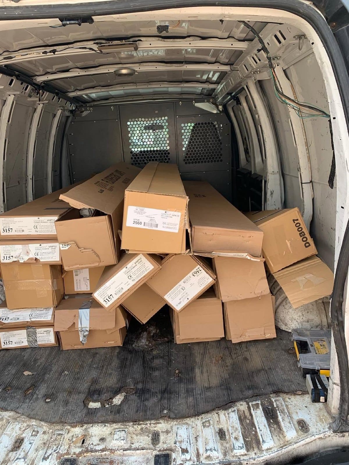 The Gem City Recycling van loaded with cartons of spent lamps